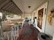 Inviting front porch with seating, decorative accents, and shade, perfect for relaxing at 1704 Southgate St, Durham, NC 27703