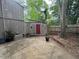 The private backyard features a red shed, and mature trees at 1708 Quail Ridge Rd, Raleigh, NC 27609
