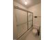 Bathroom shower features sliding glass doors, and a built in toiletry shelf at 1708 Quail Ridge Rd, Raleigh, NC 27609