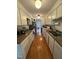 Efficient kitchen with laminate countertops and essential appliances at 1708 Quail Ridge Rd, Raleigh, NC 27609