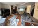 Spacious living room with a fireplace and a stylish accent rug at 1708 Quail Ridge Rd, Raleigh, NC 27609