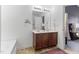 Well-lit bathroom with double sink vanity, large mirror, and decorative accents for a fresh, clean feel at 194 Catskill Ct, Burlington, NC 27217