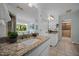 Elegant bathroom with double sinks, granite countertops, and an abundance of natural light at 1973 Elon Ossipee Rd, Elon, NC 27244