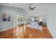 Spacious main bedroom with vaulted ceilings, bay windows, hardwood floors, and a plush rug at 1973 Elon Ossipee Rd, Elon, NC 27244