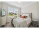 Cozy bedroom featuring soft carpet, a comfortable bed, and a bright window view at 2009 Latham Oaks Ave, Wake Forest, NC 27587