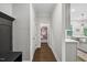 Hallway featuring hardwood floors with storage closet/pantry at 2009 Latham Oaks Ave, Wake Forest, NC 27587