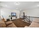 Upstairs living area/loft boasts hardwood floors and room for entertaining at 2009 Latham Oaks Ave, Wake Forest, NC 27587