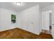 Cozy bedroom with hardwood floors, closet, and a window offering a natural view at 2085 Enon Rd, Oxford, NC 27565