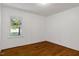 Bedroom with hardwood floors, window, and white trim at 2085 Enon Rd, Oxford, NC 27565