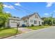 Charming two-story home with an attached garage and well-maintained lawn at 219 W Parker St, Graham, NC 27253