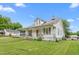 Charming home with a well-maintained lawn and classic architecture, capturing a serene suburban setting at 219 W Parker St, Graham, NC 27253