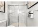 This bathroom has a tile floor and clear sliding shower door, with chrome accents at 220 Rosewood Dr, Sanford, NC 27330