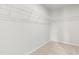 Spacious walk-in closet with carpet flooring and wire shelving for optimal organization at 220 Rosewood Dr, Sanford, NC 27330