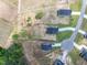 Drone's-eye view of homes under construction in a developing residential area, with cul-de-sac street design at 224 Wild Turkey Way, Lillington, NC 27546
