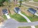 Aerial view of modern homes with manicured lawns and long driveways in a residential neighborhood at 224 Wild Turkey Way, Lillington, NC 27546