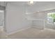 A neutral bonus room featuring carpeted floor and a window at 224 Wild Turkey Way, Lillington, NC 27546