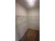 Walk-in closet with metal shelves for efficient storage at 224 Wild Turkey Way, Lillington, NC 27546