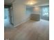 Bright loft area with neutral carpet, natural light from a window, and a view of the outdoors at 224 Wild Turkey Way, Lillington, NC 27546