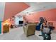 A bonus room is complete with soft lighting, comfortable seating, and exercise equipment at 229 Hocutt Farm Dr Dr, Clayton, NC 27527