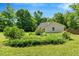 Beautiful backyard showcasing lush greenery, well-maintained landscaping, and a serene view of the property at 25 Misty Way, Franklinton, NC 27525