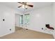 Bedroom featuring carpet, base molding, window with blinds, and mirrored closet at 25 Misty Way, Franklinton, NC 27525