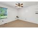 Bedroom featuring carpet, base molding, and window with blinds at 25 Misty Way, Franklinton, NC 27525