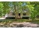 Charming single-story home featuring a welcoming front porch and well-manicured landscaping at 25 Misty Way, Franklinton, NC 27525