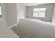 Bedroom featuring carpet, a window, and natural light at 3021 Remington Oaks Cir, Cary, NC 27519