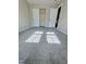 Spacious bedroom with plush carpeting featuring closet with double doors at 3021 Remington Oaks Cir, Cary, NC 27519
