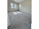 Bright bedroom features neutral carpeting, large windows providing plenty of natural light at 3021 Remington Oaks Cir, Cary, NC 27519
