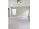 Large bedroom with trey ceilings, plush carpeting and multiple windows creating a bright, airy feel at 3021 Remington Oaks Cir, Cary, NC 27519