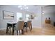Cozy dining room with contemporary decor and an open layout at 3021 Remington Oaks Cir, Cary, NC 27519