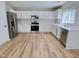 Modern kitchen with stainless steel appliances and white cabinets at 3021 Remington Oaks Cir, Cary, NC 27519