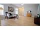 Spacious living room with light-filled windows and a cozy seating arrangement at 3021 Remington Oaks Cir, Cary, NC 27519