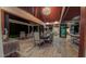 Elegant dining room with a chandelier and open floor plan, seamlessly connecting indoor and outdoor living spaces at 3197 Carriage Creek Ct, Haw River, NC 27258