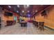 Spacious game room with pool table, bar, multiple TVs and hardwood floors at 3197 Carriage Creek Ct, Haw River, NC 27258