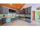 Well-equipped kitchen featuring a stainless steel sink and appliances with built-in ovens at 3197 Carriage Creek Ct, Haw River, NC 27258