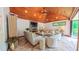 Bright living room with vaulted ceilings, stone fireplace, and comfortable seating arrangement at 3197 Carriage Creek Ct, Haw River, NC 27258