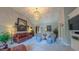 Spacious living room with high ceilings, fireplace, and ample seating at 3197 Carriage Creek Ct, Haw River, NC 27258