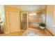 Bright and airy main bathroom featuring a large glass shower and modern fixtures at 3197 Carriage Creek Ct, Haw River, NC 27258