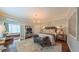A view into the main bedroom that features a sitting room and beautiful windows for natural light at 3197 Carriage Creek Ct, Haw River, NC 27258