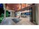 Expansive outdoor living area with a vaulted ceiling, showcasing an open transition to the dining and living spaces at 3197 Carriage Creek Ct, Haw River, NC 27258