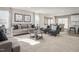 Bright living room featuring comfortable seating, neutral tones, and an open floor plan at 32 Elmwood Ave, Sanford, NC 27330