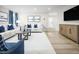 Cozy living room with hardwood floors, modern furnishings, and a neutral color palette at 34 Elmwood Ave, Sanford, NC 27330