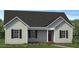 Inviting single-story home with a classic design, gray siding, and a cozy front porch entrance at 4456 Poppy Mallow Ln, Oxford, NC 27565
