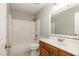 A clean, bright bathroom with a shower-tub combo and modern vanity at 5008 Dantonville Ct, Knightdale, NC 27545