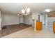 Open living space featuring hardwood floors seamlessly connected to dining area, creating an airy feel at 5008 Dantonville Ct, Knightdale, NC 27545