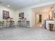 Spacious basement area features retro bar stools and a kitchenette, perfect for entertaining at 540 Vista Del Lago Ln, Wake Forest, NC 27587