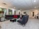 Finished basement with seating area, kitchenette, and stylish design, perfect for relaxing or entertaining at 540 Vista Del Lago Ln, Wake Forest, NC 27587