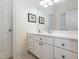 Bathroom featuring a white vanity and neutral tiled floors at 540 Vista Del Lago Ln, Wake Forest, NC 27587